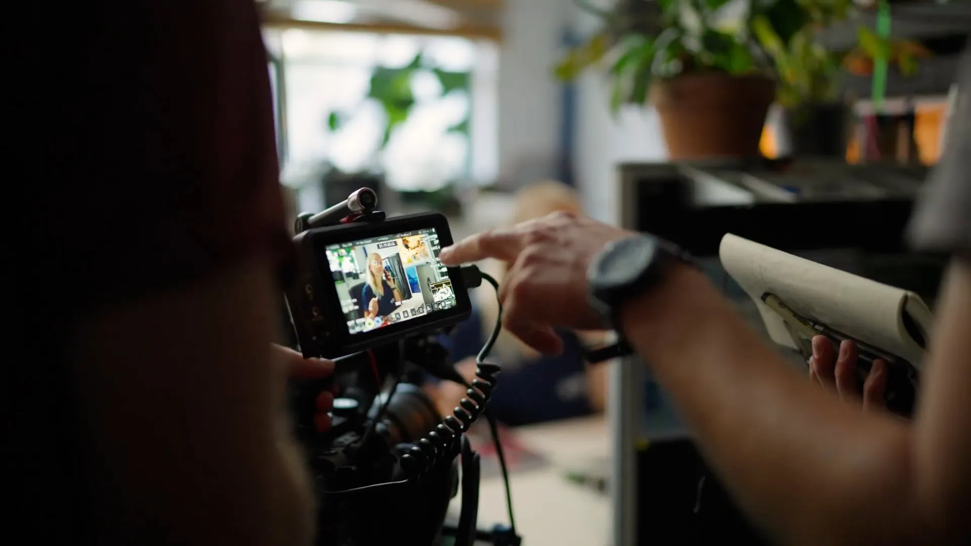 Reviewing a shot on the FX6 monitor during a corporate interview
